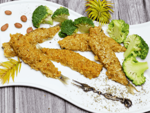 Fried capelin breaded with cornmeal and peanuts