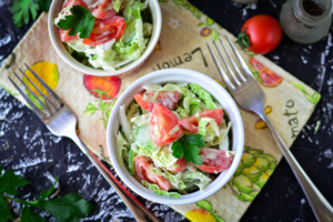 Salad with chinese cabbage, tomatoes and cucumbers