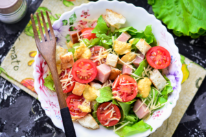 Caesar salad with ham
