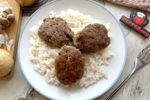 Classic minced meat cutlets in a frying pan