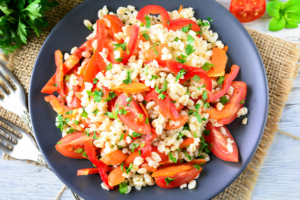 Warm salad with bulgur and vegetables